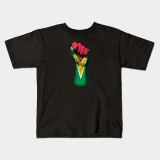 Flag of Guyana on a Raised Clenched Fist Kids T-Shirt